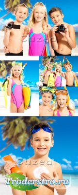       | Group of children with cameras on a summer beach - Stock photo
