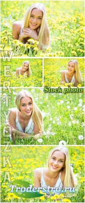        / Girl in a field with flowers and  ...