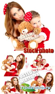     / Christmas woman with a little girl - stock photo